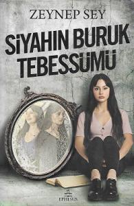 Siyahın Buruk Tebessümü - Ciltli Kitap Siyahın Buruk Tebessümü - Ciltli Kitap